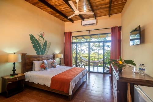 Ένα ή περισσότερα κρεβάτια σε δωμάτιο στο Rinconcito Lodge