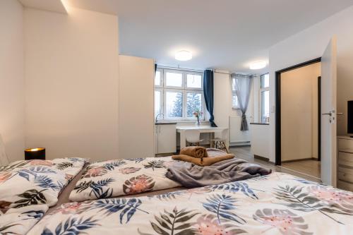 Postel nebo postele na pokoji v ubytování Apartments Brno-center