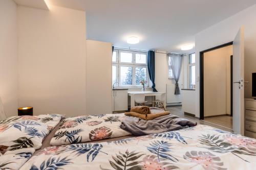 Posteľ alebo postele v izbe v ubytovaní APARTIA Skořepka, Brno-centrum
