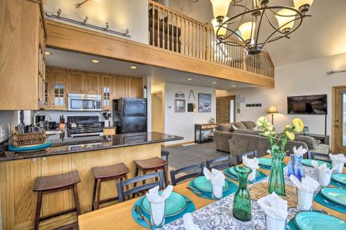 a dining room and living room with a table and chairs at Logan Road Lookout, Lincoln City Home with Game Room in Lincoln City