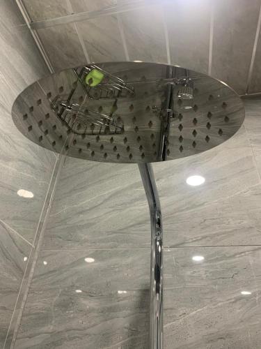 a surfboard sitting on top of a ceiling at Travis House Three Luxury Modern Living free WiFi in Burnley