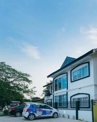 a car parked in front of a house at The Avery Suites, East Legon in Accra