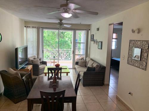 a living room with a couch and a table at Boqueron vacation in Boqueron