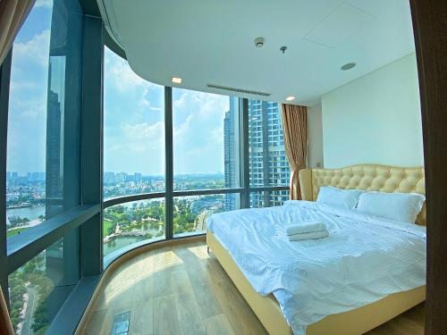 Giường trong phòng chung tại Landmark 81 - AirBnb
