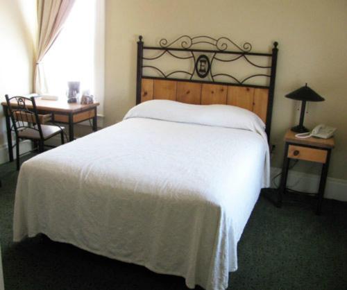 Ένα ή περισσότερα κρεβάτια σε δωμάτιο στο Hotel Eklund
