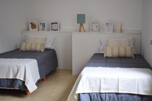 A bed or beds in a room at En Origen