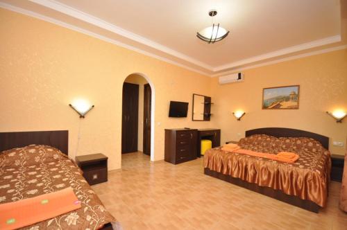 Cama o camas de una habitación en Magnoliya