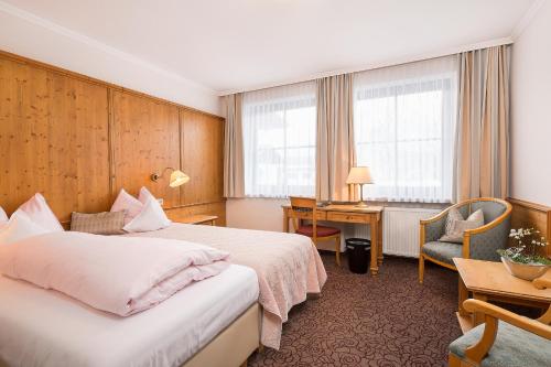 Postel nebo postele na pokoji v ubytování Alpenrose Kufstein