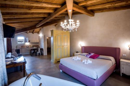 Ένα ή περισσότερα κρεβάτια σε δωμάτιο στο Agriturismo Pratello