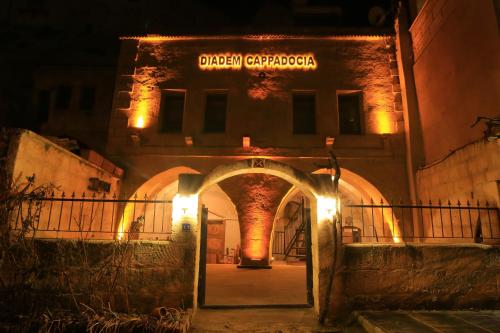 an entrance to a building with a sign that reads dixon consulate at DIADEM CAPPADOCIA GUEST HOUSE & HOSTEL in Goreme