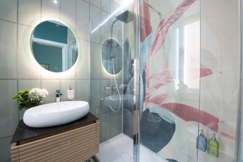 Et badeværelse på Maison et studio l'Orangerie