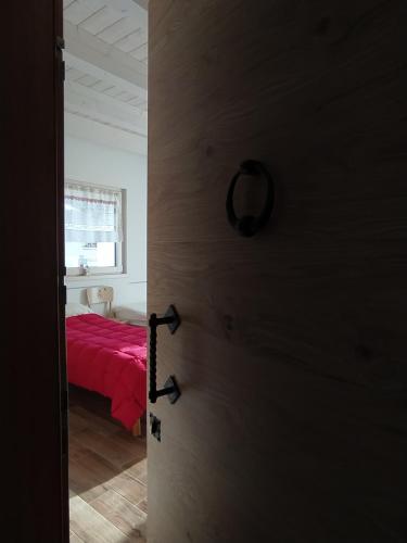 Una cama o camas en una habitación de Idroblu Bondone Lago d'Idro