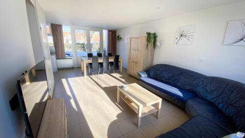 Χώρος καθιστικού στο Vakantiewoning Kaviaar