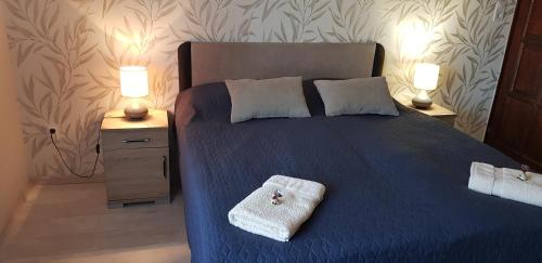 Katil atau katil-katil dalam bilik di Rózsa Apartmanház