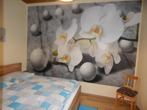 Una cama o camas en una habitación de Boros Vendégház I.