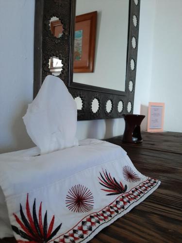 Ένα ή περισσότερα κρεβάτια σε δωμάτιο στο Casa de Siete Balcones Hotel Boutique