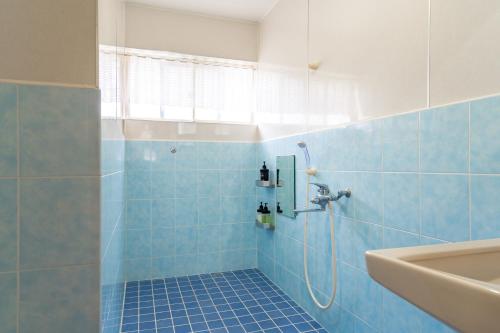 Koupelna v ubytování Type B Room 40平米 -ウル エスポワール那覇-