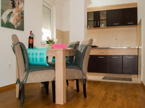 Kuchyň nebo kuchyňský kout v ubytování Apartman Soko