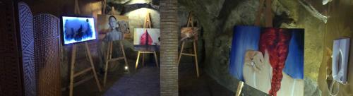 a room with paintings on the walls of a room at B&B al centro storico in Troina