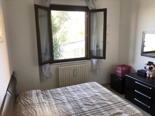 Postel nebo postele na pokoji v ubytování Appartamento Sole