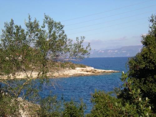 an island in the middle of a body of water at The Kantada Villas Petros, Eleni, Stelios & Dioni in Gaios