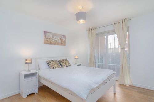 Ένα ή περισσότερα κρεβάτια σε δωμάτιο στο Kentmere Apartment Thamesmead