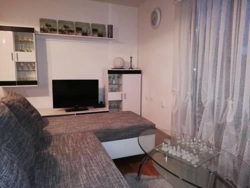 Μια τηλεόραση ή/και κέντρο ψυχαγωγίας στο Holiday Home Tin