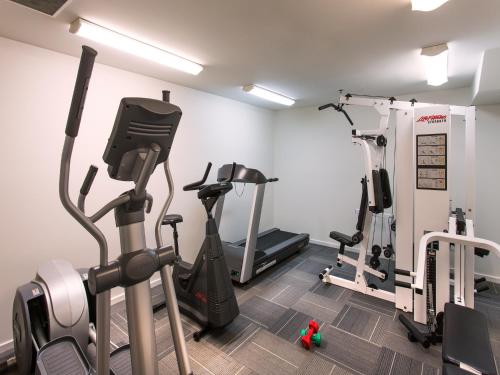a gym with exercise bikes and tread machines at The Chancellor on Currie in Adelaide