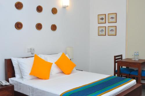 Postel nebo postele na pokoji v ubytování Comfort@15 Hotel Colombo