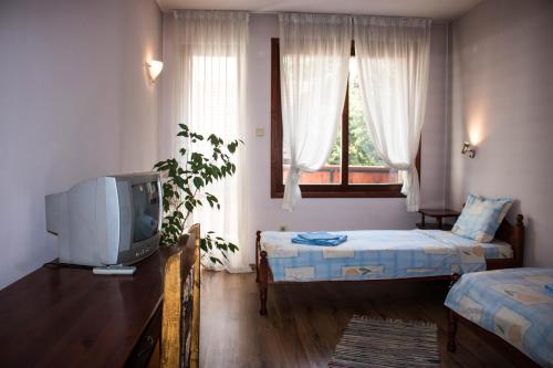 Postel nebo postele na pokoji v ubytování Guest House Ilinden