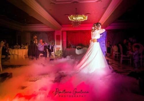 a bride and groom dancing on the dance floor at Grand Hotel Stella Maris Italia in Palmi