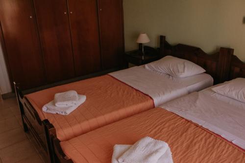 Postel nebo postele na pokoji v ubytování Flamingo Apartments