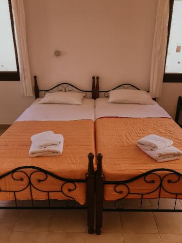 Postel nebo postele na pokoji v ubytování Flamingo Apartments