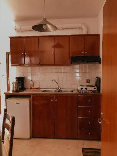 Kuchyň nebo kuchyňský kout v ubytování Flamingo Apartments