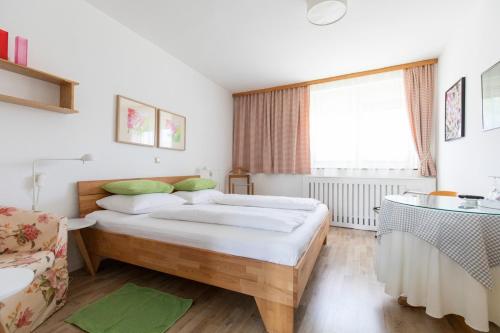 Postel nebo postele na pokoji v ubytování Pension Tadtendrang