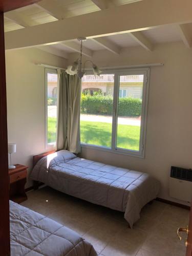 Postel nebo postele na pokoji v ubytování Casa Juno Pinamar Norte