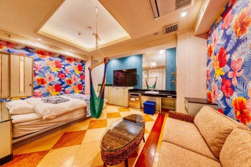 Postel nebo postele na pokoji v ubytování Hotel Atlantis Hawaiian Resorts(Adult only)