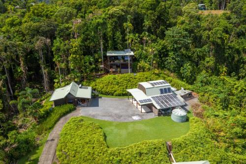 an aerial view of a house with a solarium at Daintree Holiday Homes - La Vista in Cow Bay