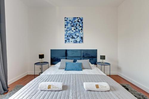 Vuode tai vuoteita majoituspaikassa White Sea Shore - Premium Nadmorze Apartment