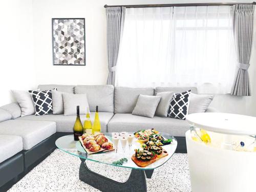 Ruang duduk di OUCHI HOTEL SUITE Temma