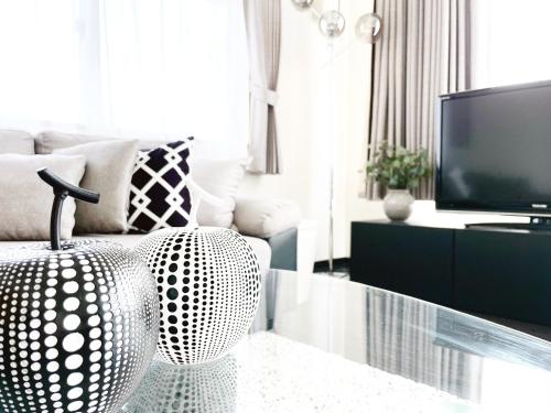 Televisyen dan/atau pusat hiburan di OUCHI HOTEL SUITE Temma