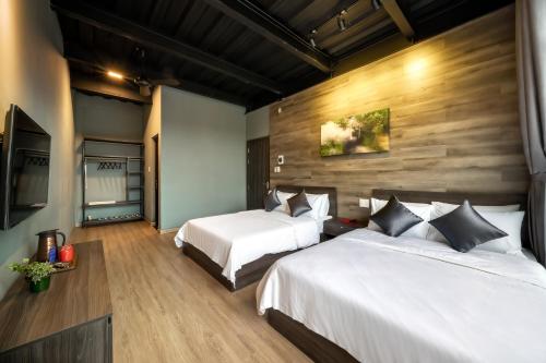 Un ou plusieurs lits dans un hébergement de l'établissement Bach Duong Hotel