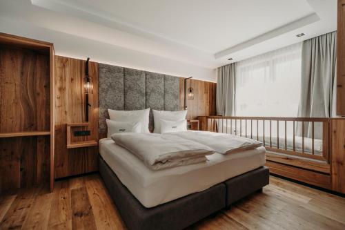 Postel nebo postele na pokoji v ubytování PoSt Boutique Apartments