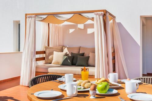 Et opholdsområde på The Patio Suite Hotel