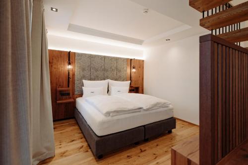 PoSt Boutique Apartmentsにあるベッド