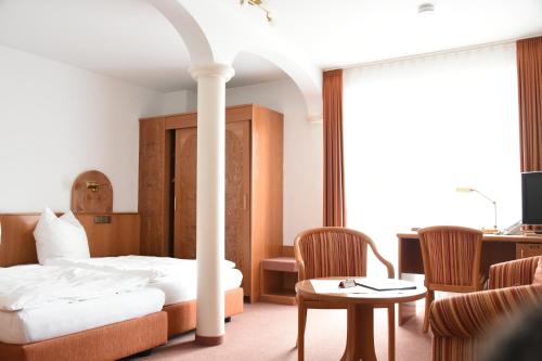 Ένα ή περισσότερα κρεβάτια σε δωμάτιο στο Boarding House Remstal