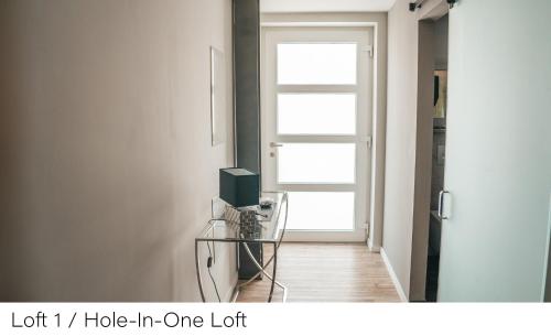 a room with a glass table and a window at Events and Stay in Neustadt/Harz