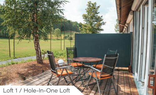 a patio with a table and chairs on a porch at Events and Stay in Neustadt/Harz