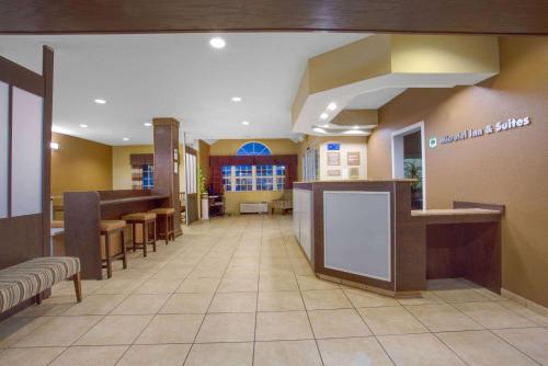 a lobby of a hospital with a waiting room at Microtel Inn & Suites by Wyndham Harrisonburg in Harrisonburg