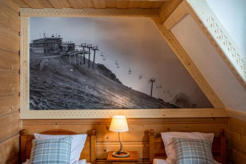 Letto o letti in una camera di Willa Pod Niebem